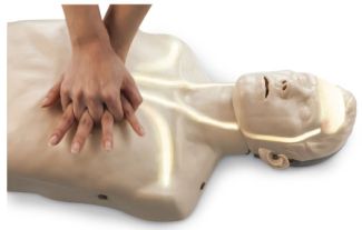 Brayden with Red Lights CPR Manikin